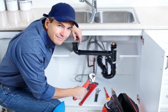 Logic Electrical & Plumbing team member at work
