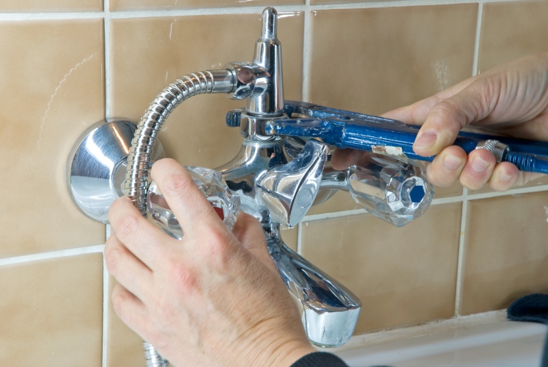 Shower being installed in a Fulham bathroom